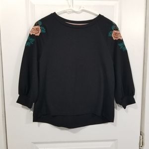 Anthropologie W5 black knit top with flower sleeve